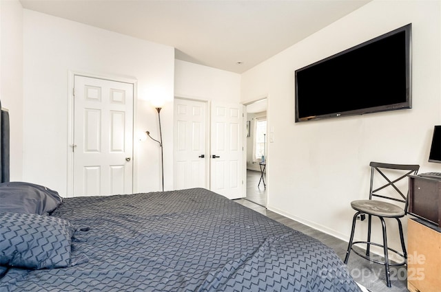 8424 Spirea Ct, Charlotte, NC 28215 - bedroom with baseboards and wood finished floors