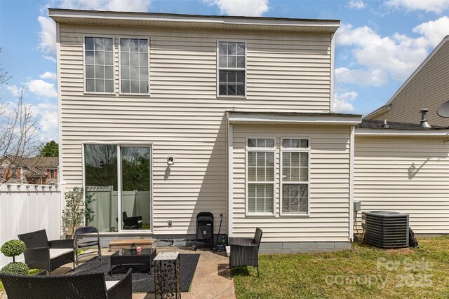 8424 Spirea Ct, Charlotte, NC 28215 - rear view of property with central air condition unit, fence, an outdoor hangout area, a yard, and a patio