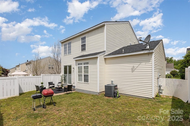 8424 Spirea Ct, Charlotte, NC 28215 - rear view of property with a lawn, central AC, and a fenced backyard