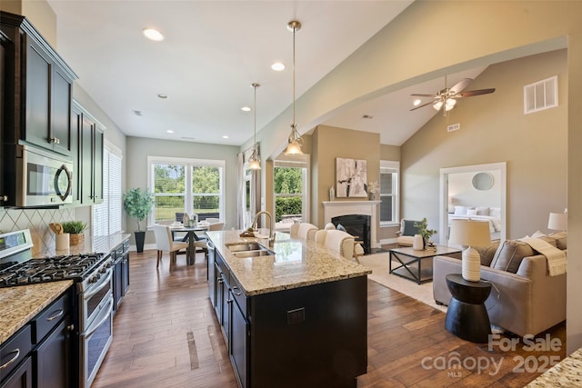 505 Chamberlain Ct, Mcadenville, NC 28101 - kitchen featuring a sink, stainless steel appliances, open floor plan, and visible vents