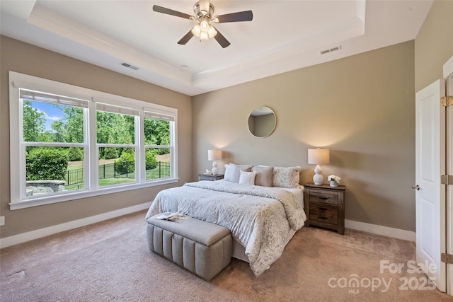 505 Chamberlain Ct, Mcadenville, NC 28101 - carpeted bedroom featuring visible vents, a ceiling fan, a raised ceiling, and baseboards
