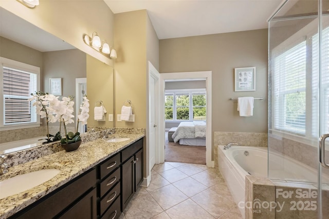 505 Chamberlain Ct, Mcadenville, NC 28101 - full bath with double vanity, tile patterned flooring, a sink, and a bath