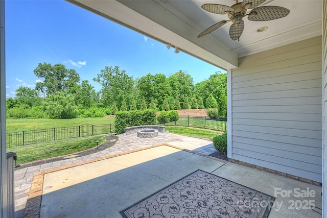505 Chamberlain Ct, Mcadenville, NC 28101 - view of patio / terrace with a ceiling fan, an outdoor fire pit, and a fenced backyard