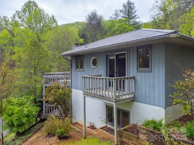 362 Cowan Valley Ests, Sylva, NC 28779 - rear view of house with metal roof and a view of trees
