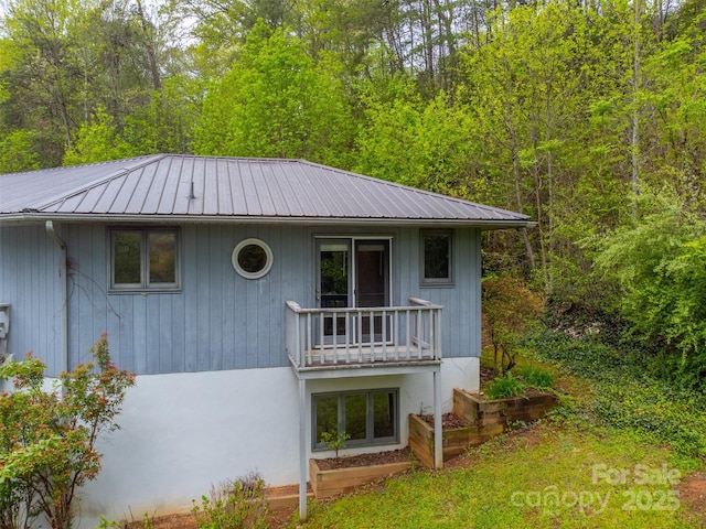 362 Cowan Valley Ests, Sylva, NC 28779 - view of front of property featuring metal roof, a view of trees, and a balcony