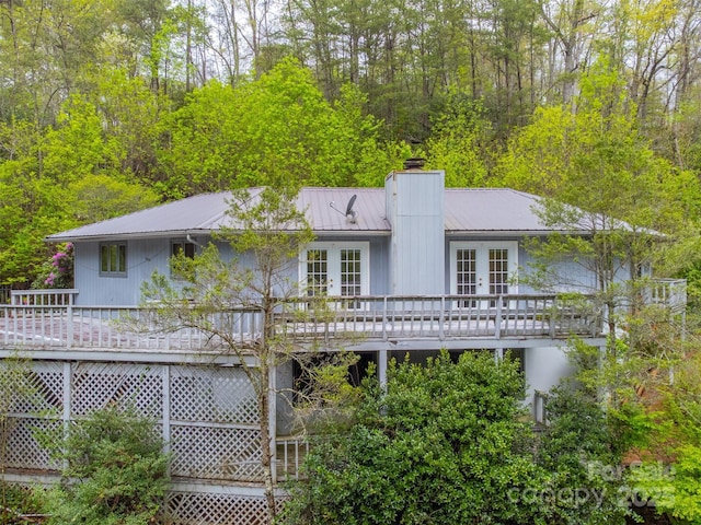 362 Cowan Valley Ests, Sylva, NC 28779 - back of house featuring french doors, a chimney, metal roof, and a deck