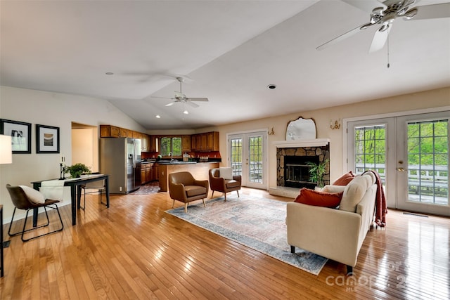 362 Cowan Valley Ests, Sylva, NC 28779 - living area with french doors, a ceiling fan, plenty of natural light, lofted ceiling, and light wood-style flooring