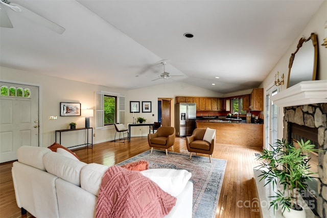 362 Cowan Valley Ests, Sylva, NC 28779 - living area featuring ceiling fan, light wood-type flooring, lofted ceiling, a fireplace, and recessed lighting