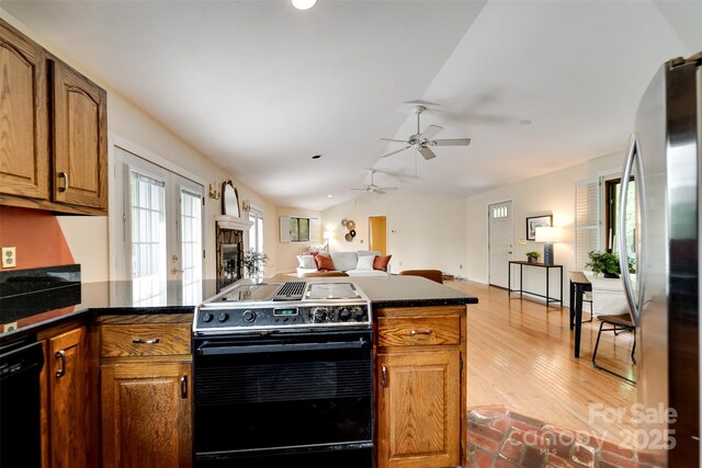 362 Cowan Valley Ests, Sylva, NC 28779 - kitchen with electric range, freestanding refrigerator, open floor plan, healthy amount of natural light, and vaulted ceiling