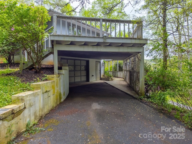 362 Cowan Valley Ests, Sylva, NC 28779 - view of parking / parking lot featuring a carport and driveway