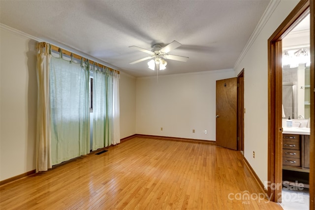 362 Cowan Valley Ests, Sylva, NC 28779 - empty room with light wood-style floors, ceiling fan, crown molding, and a textured ceiling