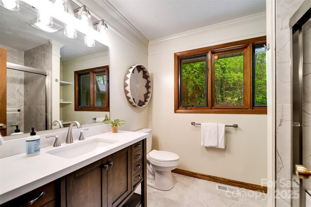362 Cowan Valley Ests, Sylva, NC 28779 - full bathroom with vanity, a shower stall, crown molding, and marble look tile flooring
