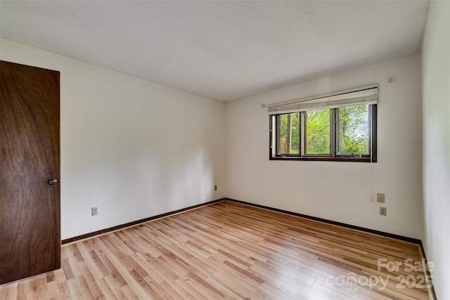 362 Cowan Valley Ests, Sylva, NC 28779 - unfurnished room with light wood-style floors and baseboards