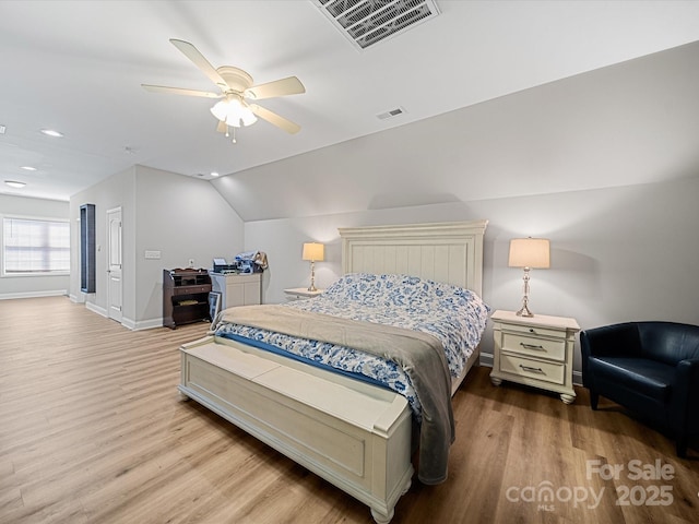 bedroom featuring wood finished floors, baseboards, vaulted ceiling, ceiling fan, and recessed lighting