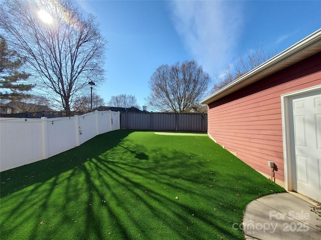 view of yard featuring a fenced backyard