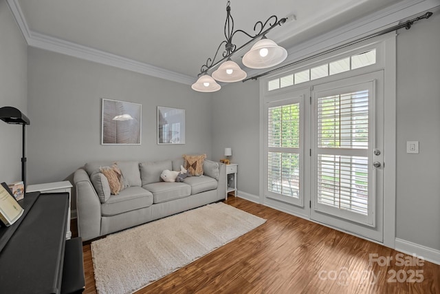 1508 Peaceful Way Dr, Charlotte, NC 28206 - living room featuring ornamental molding, baseboards, and wood finished floors