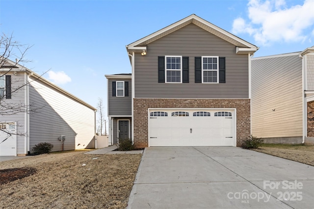 2120 Redstone Dr, York, SC 29745 - traditional-style home with brick siding, concrete driveway, and a garage