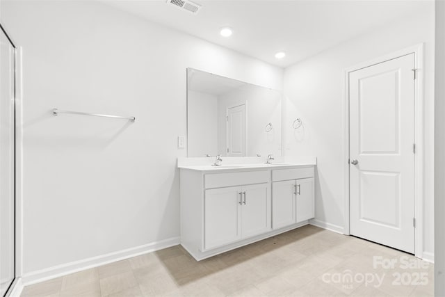 2120 Redstone Dr, York, SC 29745 - full bathroom featuring double vanity, baseboards, tile patterned floors, and recessed lighting