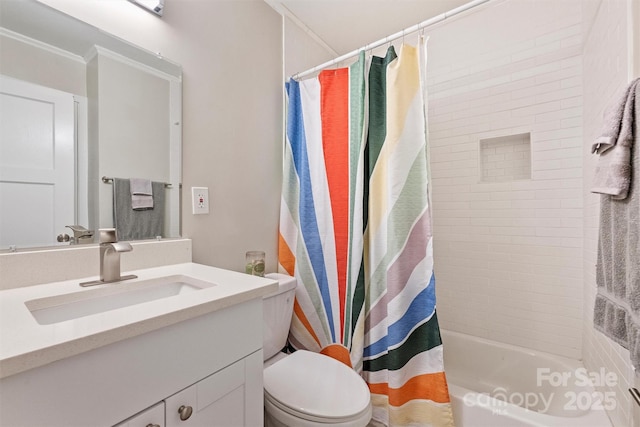 bathroom with shower / tub combo, toilet, ornamental molding, and vanity