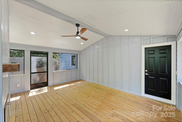 interior space featuring ceiling fan