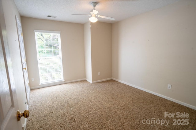 134 Walmsley Pl, Mooresville, NC 28117 - carpeted spare room featuring a textured ceiling, visible vents, a ceiling fan, and baseboards