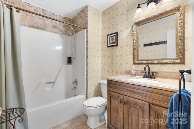 bathroom featuring tile patterned floors, toilet, shower / tub combo, wallpapered walls, and vanity