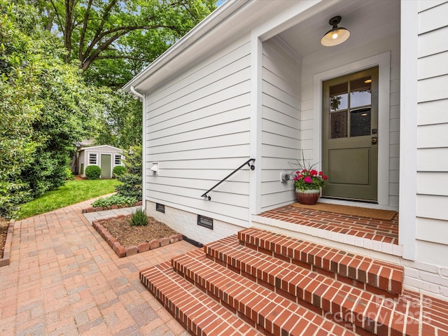 view of exterior entry featuring crawl space