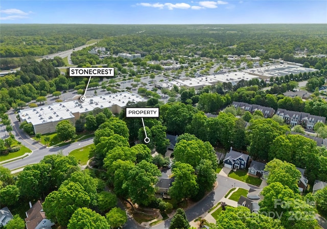 bird's eye view with a forest view