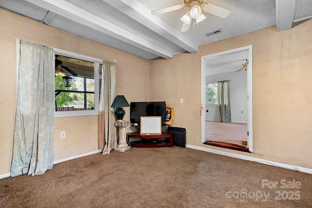 3265 W Innes St, Salisbury, NC 28144 - unfurnished room with carpet flooring, beam ceiling, visible vents, baseboards, and ceiling fan