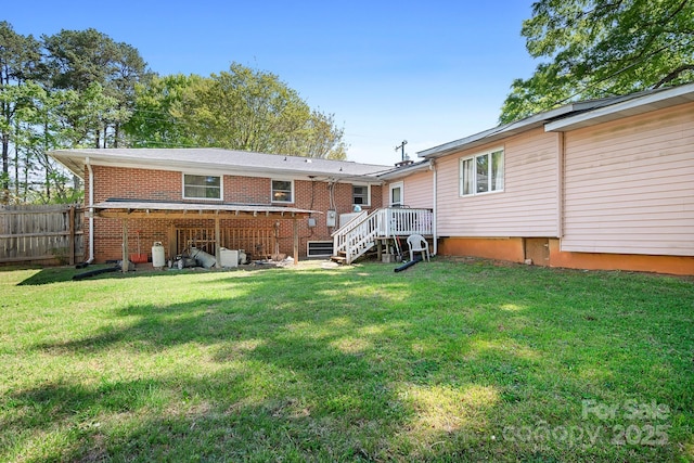 3265 W Innes St, Salisbury, NC 28144 - rear view of property with a yard, fence, stairs, and brick siding