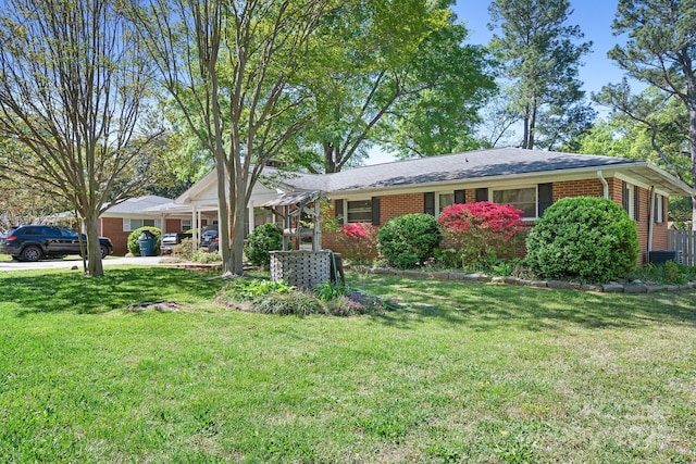 3265 W Innes St, Salisbury, NC 28144 - ranch-style home with a front lawn and brick siding
