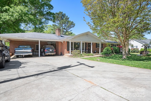 3265 W Innes St, Salisbury, NC 28144 - view of front of property with concrete driveway, brick siding, a chimney, and a front yard