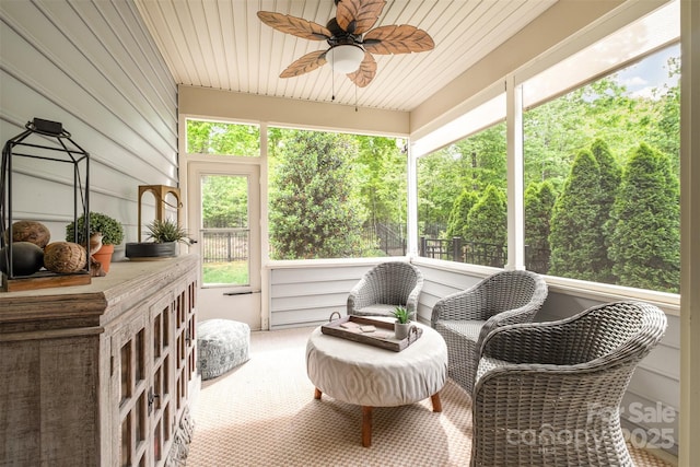 sunroom / solarium with ceiling fan