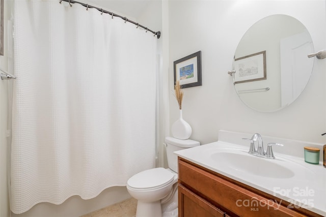 bathroom with shower / tub combo with curtain, tile patterned floors, vanity, and toilet