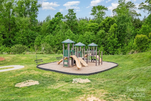 community jungle gym with a yard