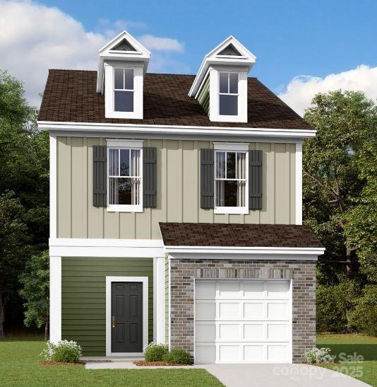 view of front of property with board and batten siding, concrete driveway, and an attached garage
