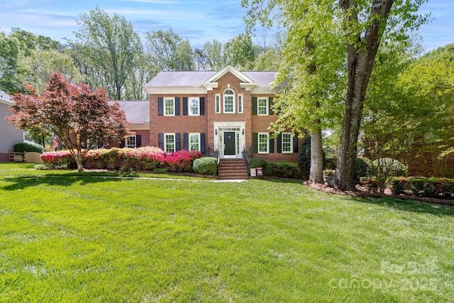 14812 Stonegreen Ln, Huntersville, NC 28078 - colonial home with brick siding and a front yard