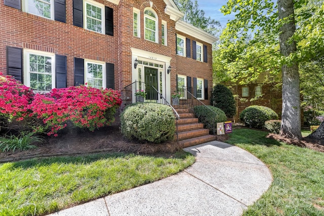 14812 Stonegreen Ln, Huntersville, NC 28078 - view of front facade with brick siding and a front yard