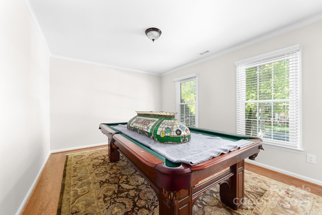 14812 Stonegreen Ln, Huntersville, NC 28078 - game room featuring wood finished floors, visible vents, crown molding, and baseboards