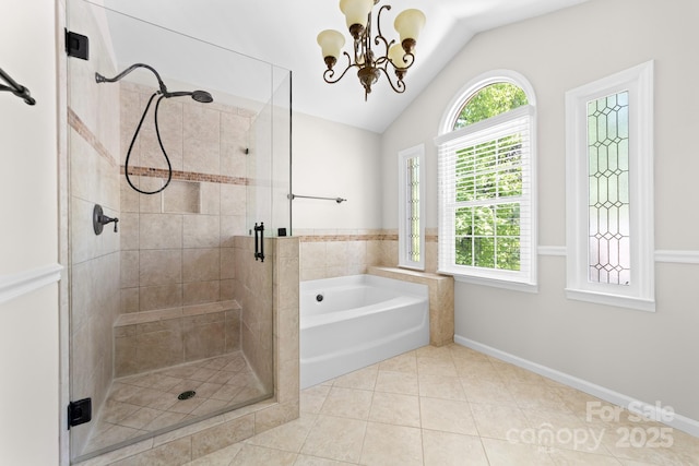 14812 Stonegreen Ln, Huntersville, NC 28078 - full bathroom with a bath, vaulted ceiling, a wealth of natural light, and a shower stall
