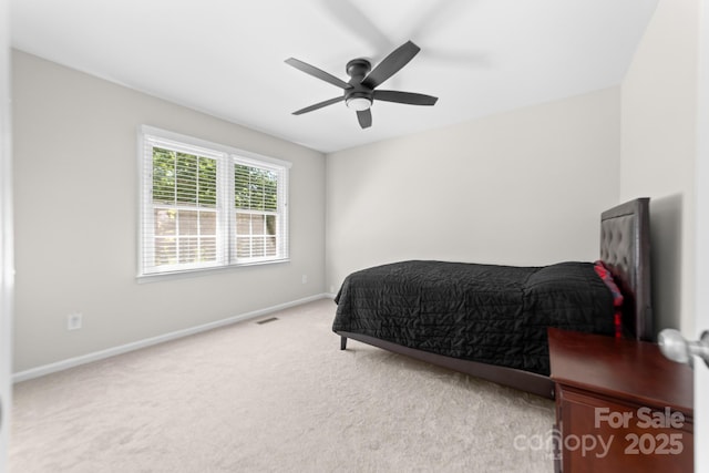 14812 Stonegreen Ln, Huntersville, NC 28078 - carpeted bedroom featuring visible vents, a ceiling fan, and baseboards