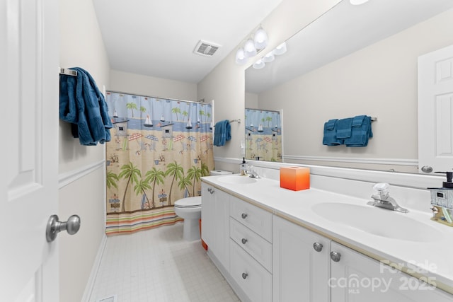 14812 Stonegreen Ln, Huntersville, NC 28078 - full bath with toilet, a sink, visible vents, and double vanity
