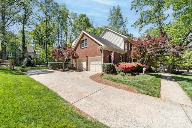 14812 Stonegreen Ln, Huntersville, NC 28078 - view of side of property with a lawn, driveway, brick siding, and a garage