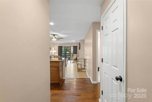 9029 J M Keynes Dr Unit 63, Charlotte, NC 28262 - corridor featuring baseboards and dark wood-style floors
