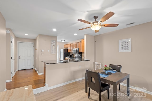 9029 J M Keynes Dr Unit 63, Charlotte, NC 28262 - dining space featuring recessed lighting, light wood finished floors, visible vents, a ceiling fan, and baseboards