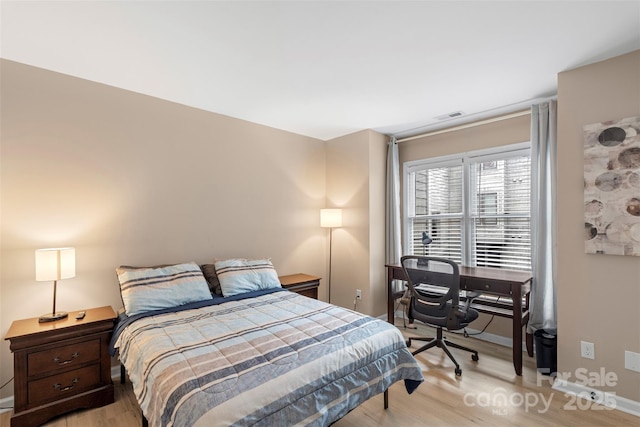 9029 J M Keynes Dr Unit 63, Charlotte, NC 28262 - bedroom featuring light wood-style flooring, visible vents, and baseboards