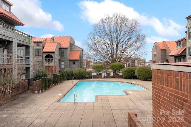 9029 J M Keynes Dr Unit 63, Charlotte, NC 28262 - community pool with fence and a patio