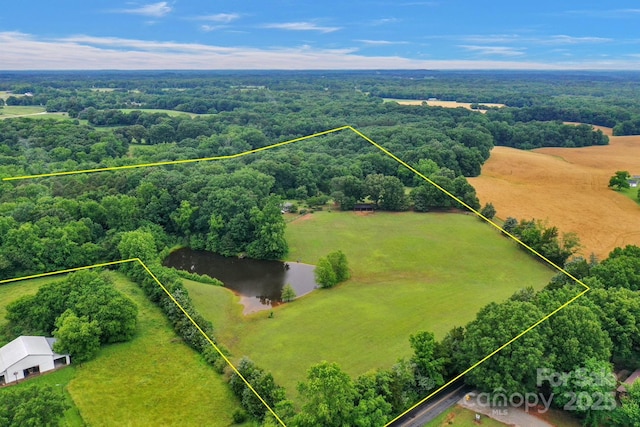 1607 Old Lawyers Rd, Marshville, NC 28103 - overview of rural landscape featuring property boundaries highlighted and a heavily wooded area