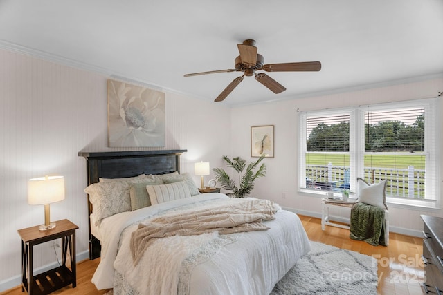 1607 Old Lawyers Rd, Marshville, NC 28103 - bedroom with ornamental molding, light wood-style floors, baseboards, and ceiling fan