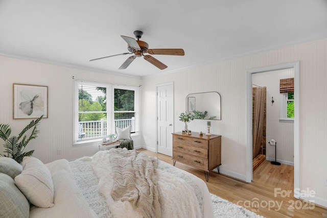 1607 Old Lawyers Rd, Marshville, NC 28103 - bedroom with ornamental molding, multiple windows, light wood-style flooring, and baseboards